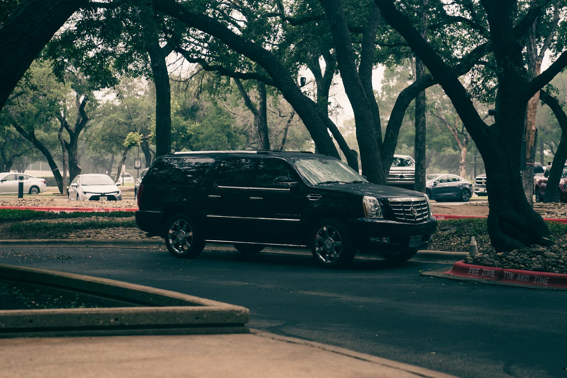 Black Cadillac Escalade luxury SUV, Volantis Limousine Services luxury SUV class