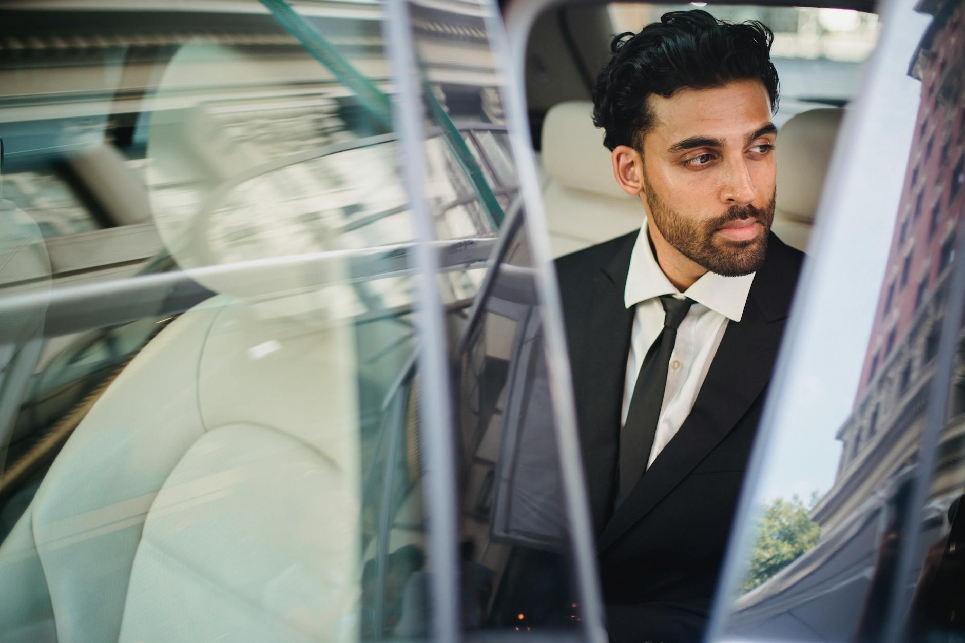 Professional executive in luxury car â€” Volantis chauffeur service Elmhurst IL