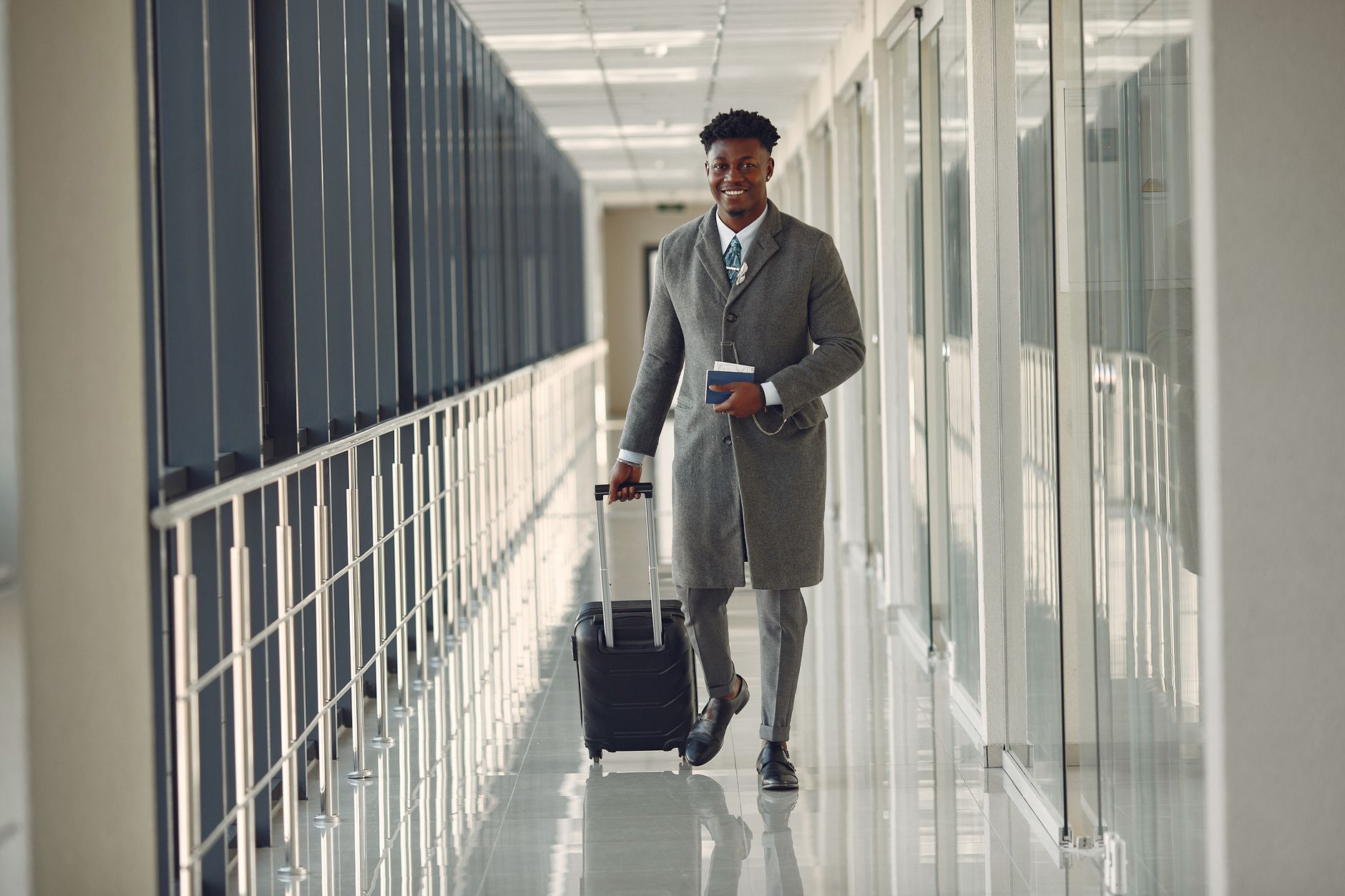 Professional traveler with suitcase at Chicago airport, Naperville limo service